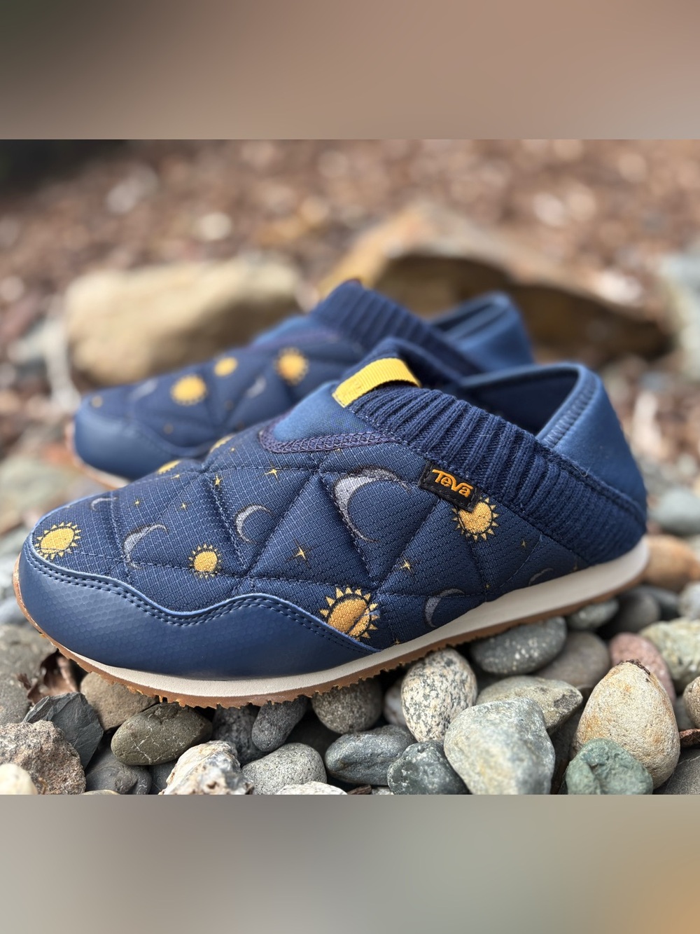 Teva women’s 7 Quilted Slip-On Slippers in Navy with Yellow Sun & Moon Print